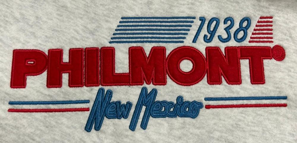 Single layer applique reading Philmont New Mexico 1938 on a heather sweatshirt